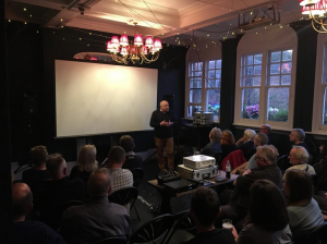 A packed audience at the White Swan, ready to watch a film but first hearing from an invited speaker